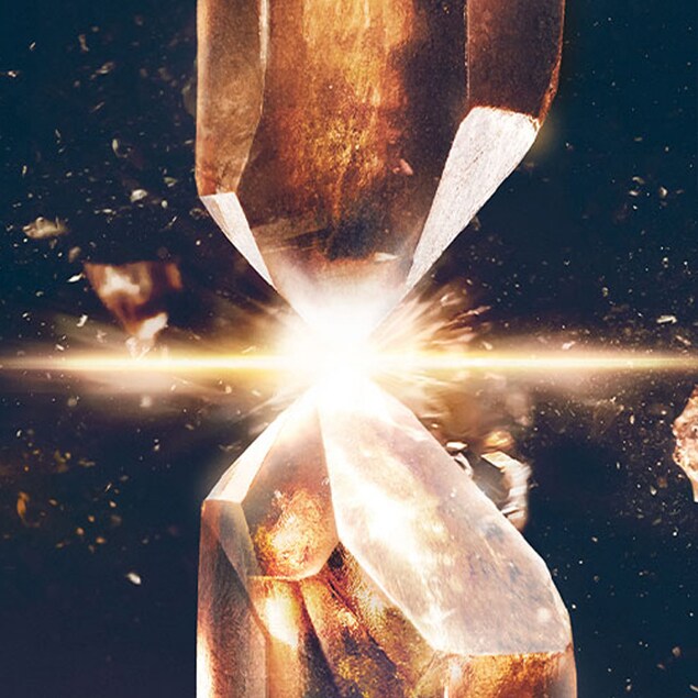 Two precious stones hitting and meeting in the middle with and explosive reaction.