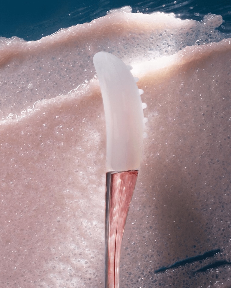 Photograph of the Lip Polish texture with the applicator spoon.