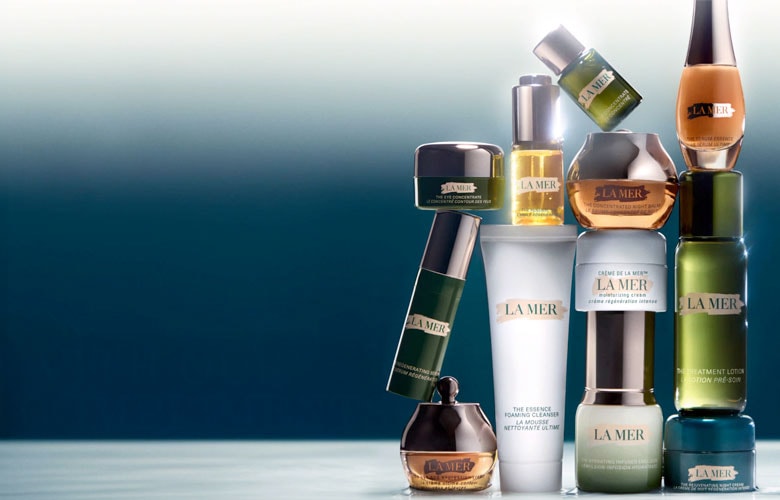Image of a mountain of la mer products with text 'with our compliments'