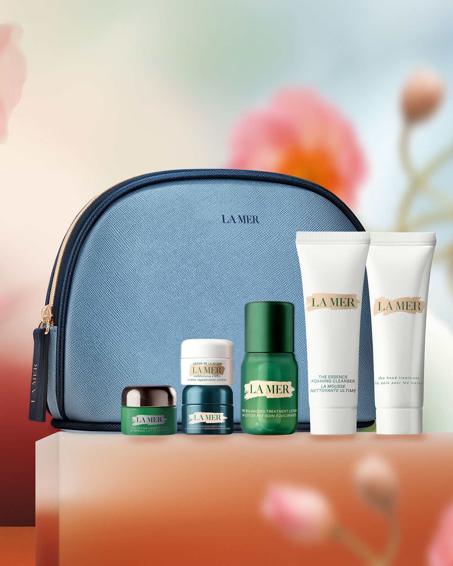 La Mer skincare gift set displayed on soft floral block worth $380.