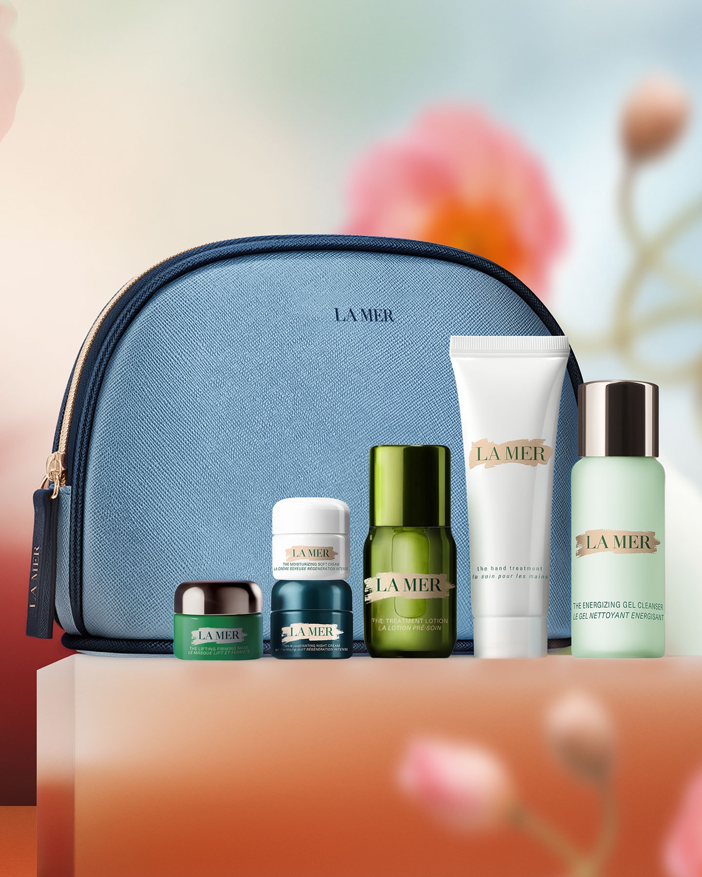 La Mer skincare gift set displayed on soft floral block worth $380.