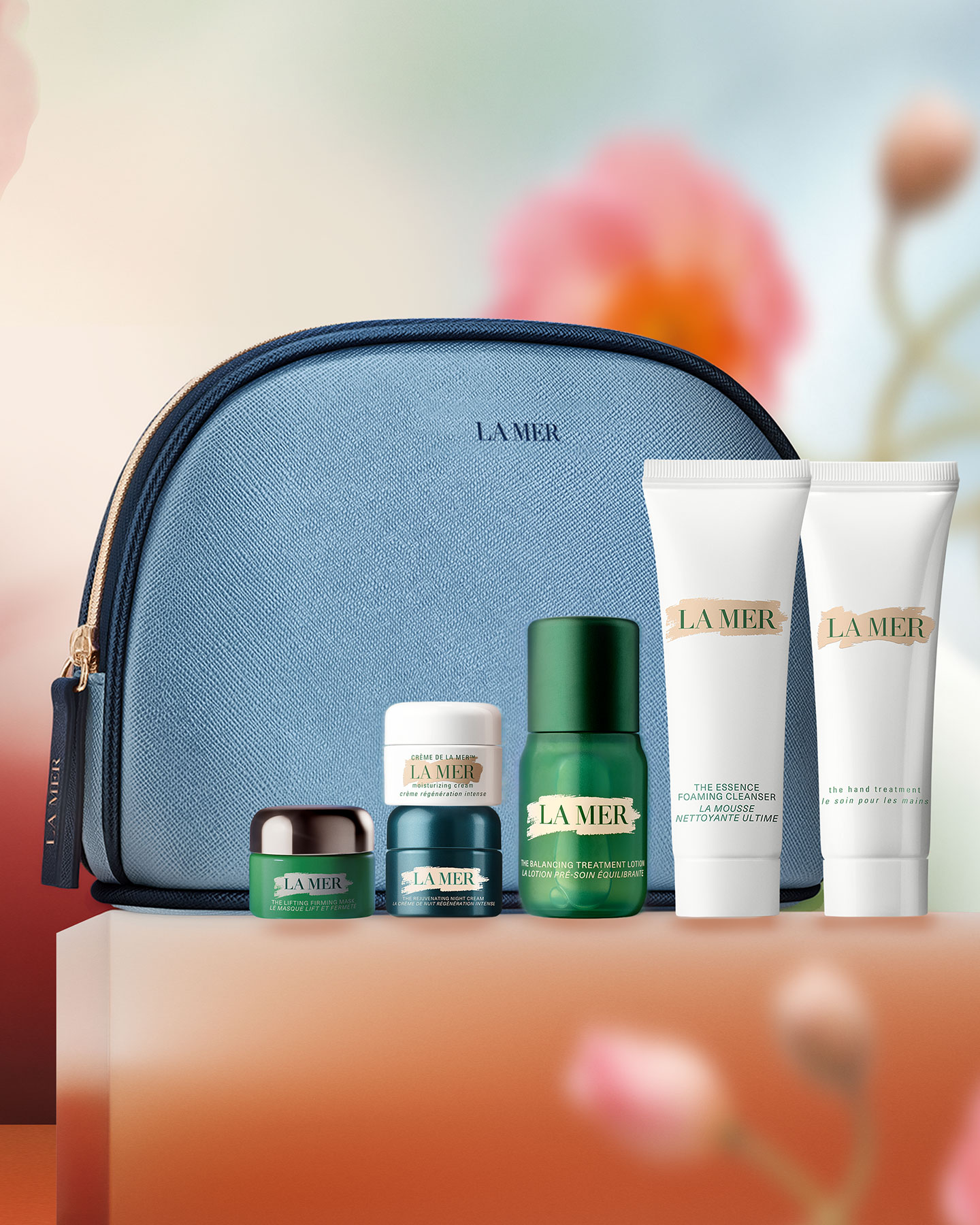 7 piece gift with bag worth $380 on a soft floral background 